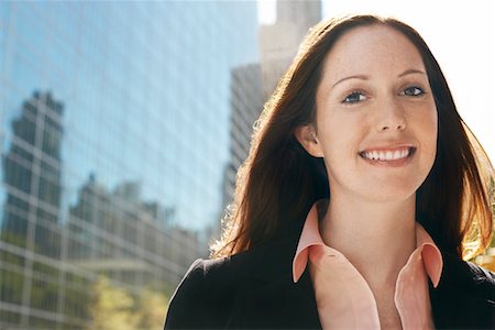 simsearch:693-03564532,k - Young woman by office building, portrait Stock Photo - Premium Royalty-Free, Code: 693-03707609