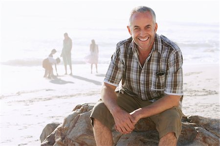 Père de la famille à la plage Photographie de stock - Premium Libres de Droits, Code: 693-03707820