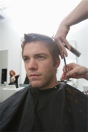 Men's hairdressing Foto de stock - Royalty Free Premium, Número: 693-03782578