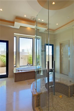 shower in a bathroom not people - Bathroom with a bath and a shower room Foto de stock - Sin royalties Premium, Código: 693-03782935