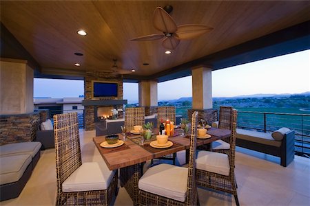 Dining room interior with outside views from windows Stock Photo - Premium Royalty-Free, Code: 693-03782972