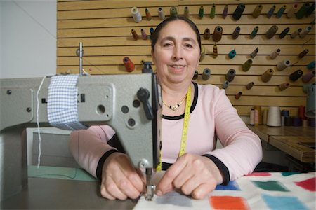 simsearch:693-03783038,k - Mature woman sewing in the laundrette Stock Photo - Premium Royalty-Free, Code: 693-03783079