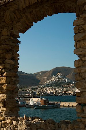 rimorchiatore - View of Town Through Window, Ermoupoli, Syros, Greece Fotografie stock - Rights-Managed, Codice: 700-04163439