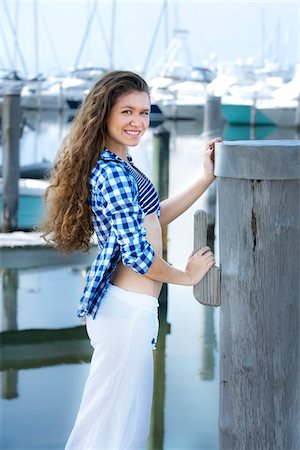 swimwear teenaged girl - Teenage Girl at Marina Stock Photo - Rights-Managed, Code: 700-04163452