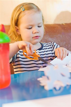 Little Girl Doing Crafts Stock Photo - Rights-Managed, Code: 700-04926432
