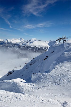 ski hill with chair lift - Chairlift up Whistler Mountain, Whistler-Blackcomb Ski Resort, Whistler, British Columbia, Canada Stock Photo - Rights-Managed, Code: 700-05389285