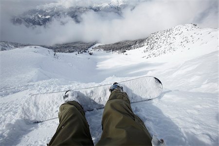 encima de las nubes - Snowboarder's Feet, Whistler Mountain, Whistler, British Columbia, Canada Foto de stock - Con derechos protegidos, Código: 700-05389327