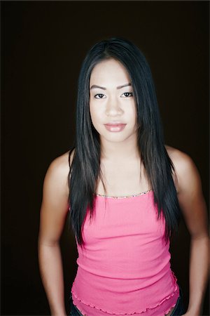 pink shirt woman - Portrait of Woman in Studio Stock Photo - Rights-Managed, Code: 700-05451012