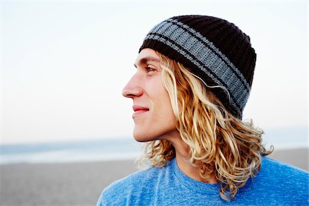 smiling young man outdoors - Homme à la plage Photographie de stock - Rights-Managed, Code: 700-05451047