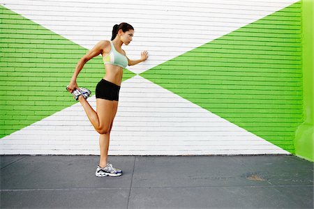 shoe on wall - Woman Stretching Stock Photo - Rights-Managed, Code: 700-05451073