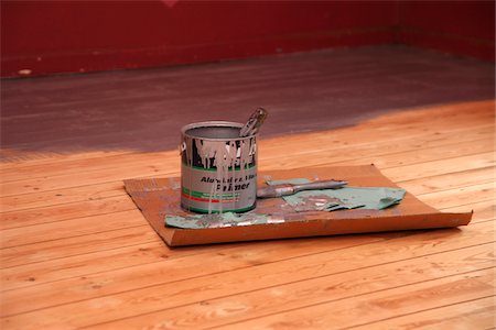 Can of Silver Paint Primer on Hardwood Floor Stock Photo - Rights-Managed, Code: 700-05451129