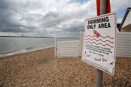 sussex - Swimming Area Sign on Pebble Beach Stock Photo - Rights-Managed, Code: 700-05451149