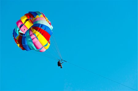 Low Angle View of Person Parasailing Foto de stock - Con derechos protegidos, Código: 700-05452038