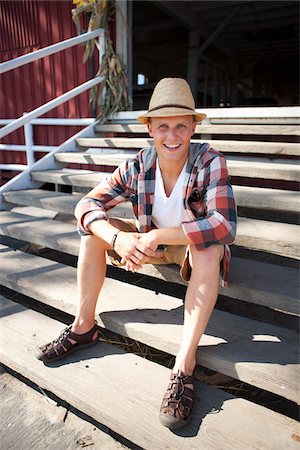 straw hat - Portrait of Man Sitting on Stairs Stock Photo - Rights-Managed, Code: 700-05452077