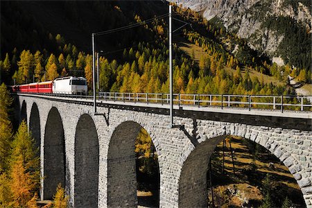 rail transportation - Train Crossing Viaduct, Preda, Albula Pass, Grisons, Switzerland Stock Photo - Rights-Managed, Code: 700-05524270