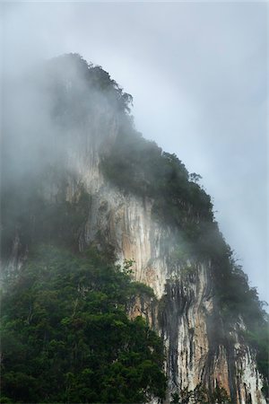 Mountain in Fog, Khao Sok Resort, Surat Thani, Thailand Stock Photo - Rights-Managed, Code: 700-05560115