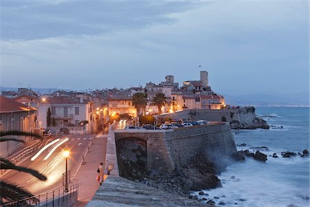 evening road with car lights - View of Old Town and Chateau Grimaldi, Antibes, Côte d'Azur, France Stock Photo - Rights-Managed, Code: 700-05560270