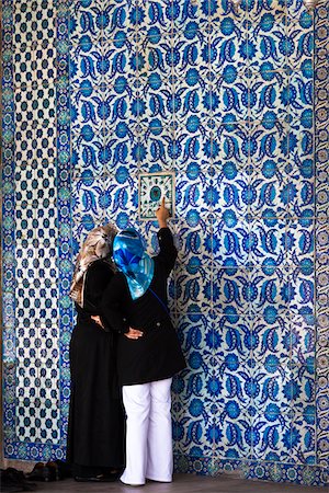 Two Woman Looking at Tile, Rustem Pasha Mosque, Istanbul, Turkey Stock Photo - Rights-Managed, Code: 700-05609533