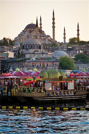 evening restaurant - Boats in front of Suleymaniye and Yeni Camii Mosques, Eminonu District, Istanbul, Turkey Stock Photo - Rights-Managed, Code: 700-05609542