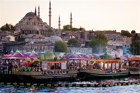 Boats in front of Suleymaniye and Yeni Camii Mosques, Eminonu District, Istanbul, Turkey Stock Photo - Rights-Managed, Code: 700-05609543