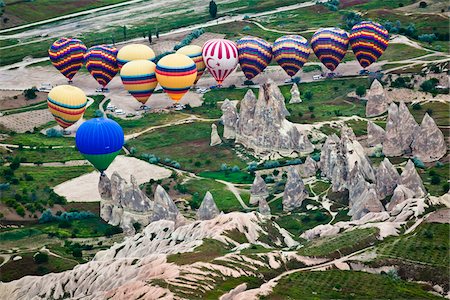 Ballons à Air chaud au-dessus de la vallée de Göreme, Cappadoce, Turquie Photographie de stock - Rights-Managed, Code: 700-05609602
