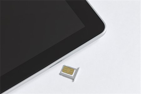 Carte Micro-SIM 3 G et iPad Tablet PC Photographie de stock - Rights-Managed, Code: 700-05641558