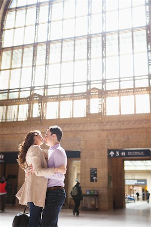 romantic women in windows - Couple Kissing in Train Station Stock Photo - Rights-Managed, Code: 700-05641787
