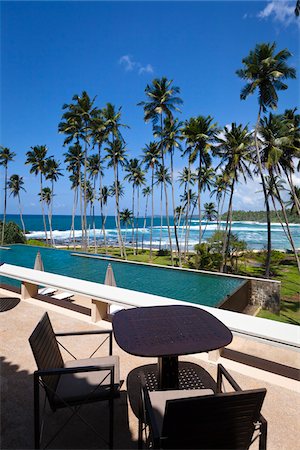 pool chairs - View of Beach from Patio, Amanwella Hotel, Tangalle, Sri Lanka Stock Photo - Rights-Managed, Code: 700-05642155