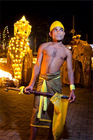 Torch Bearer, Esala Perehera Festival, Kandy, Sri Lanka Photographie de stock - Rights-Managed, Code: 700-05642301