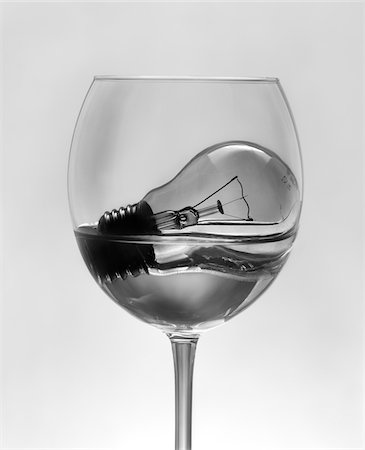 photography objects - Light Bulb Soaking in Water in Wine Glass Stock Photo - Rights-Managed, Code: 700-05756176