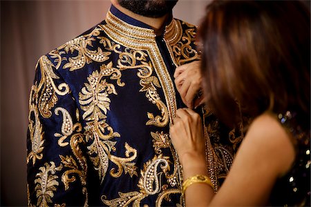 fastening - Woman Helping Groom Get Dressed Stock Photo - Rights-Managed, Code: 700-05756408