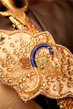 Gros plan de paon sur ceinture Photographie de stock - Rights-Managed, Code: 700-05756409
