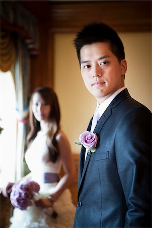 simsearch:600-05641962,k - Portrait of Groom with Bride in Background Foto de stock - Con derechos protegidos, Código: 700-05786434