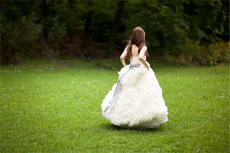 dress - Bride Walking Outdoors Stock Photo - Rights-Managed, Code: 700-05786459