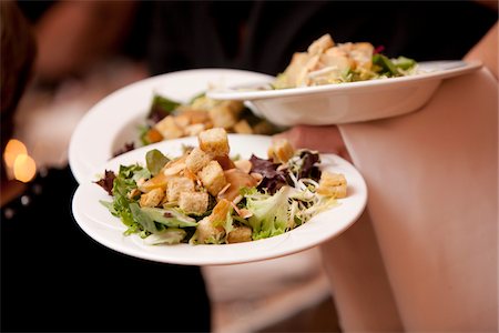 Serving Caesar Salads Fotografie stock - Rights-Managed, Codice: 700-05786596