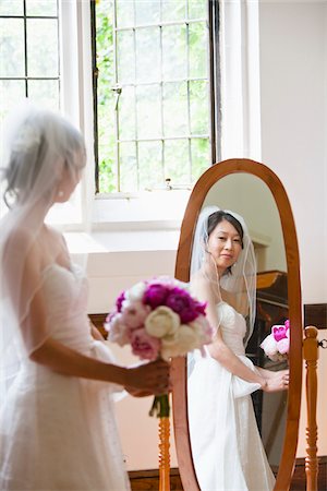 romantic wedding flower - Bride Looking into Mirror Stock Photo - Rights-Managed, Code: 700-05786618