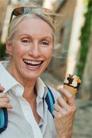 Woman Holding Ice Cream Cone Stock Photo - Rights-Managed, Code: 700-05780982