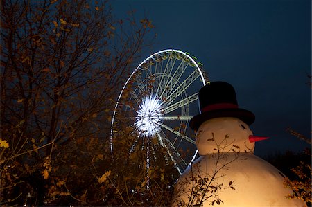 fairground rides - Plastic Snowman and Ferris Wheel during Christmas at Winter Wonderland, Hyde Park, London, England Stock Photo - Rights-Managed, Code: 700-05803412