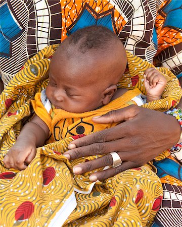 sweet - Baby in Mother's Arms, Mali, West Africa Stock Photo - Rights-Managed, Code: 700-05810135