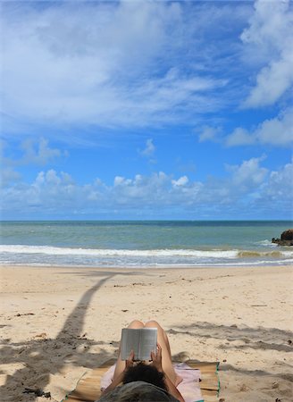 Woman Reading on Beach, Praia de Tabatinga, Paraiba, Brazil Stock Photo - Rights-Managed, Code: 700-05810247