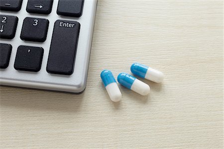 photo division - Still Life of Computer Keyboard and Pills Stock Photo - Rights-Managed, Code: 700-05948055
