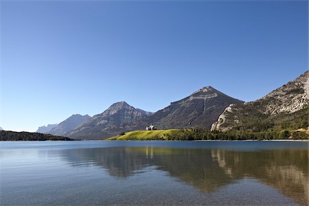 reflections of canadian mountains - Prince of Wales Hotel, Waterton Lakes National Park, Alberta, Canada Stock Photo - Rights-Managed, Code: 700-05973188