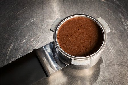 food on stainless steel - Ground Coffee in Espresso Machine Stock Photo - Rights-Managed, Code: 700-05973279