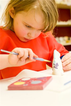 paint children - Girl Painting Ceramics Stock Photo - Rights-Managed, Code: 700-05973450