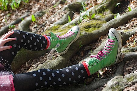 Girl Wearing Polka Dot Tights and High-Top Sneakers Stock Photo - Rights-Managed, Code: 700-05973473