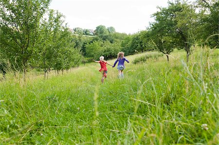 european (female) - Two Girls Running in Field Stock Photo - Rights-Managed, Code: 700-05973506