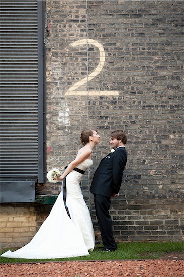 Bride and Groom with Number Two Painted on Brick Wall Stock Photo - Premium Rights-Managed, Artist: Ikonica, Image code: 700-05973651