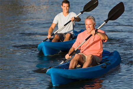 senior with adult child - Father and Son Kayaking Foto de stock - Con derechos protegidos, Código: 700-06009201