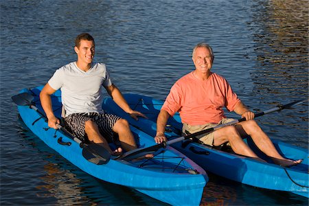 dad exercising - Père et fils en kayak Photographie de stock - Rights-Managed, Code: 700-06009202