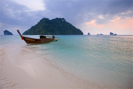 Boat Tied Up at Shore with Koh Mor and Tup Island, Andaman Sea, near Krabi, Thailand Stock Photo - Rights-Managed, Code: 700-06009366